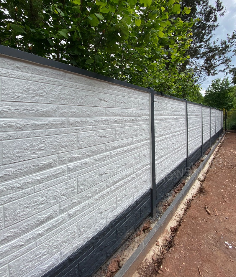 Betonzaun und Sichtschutz